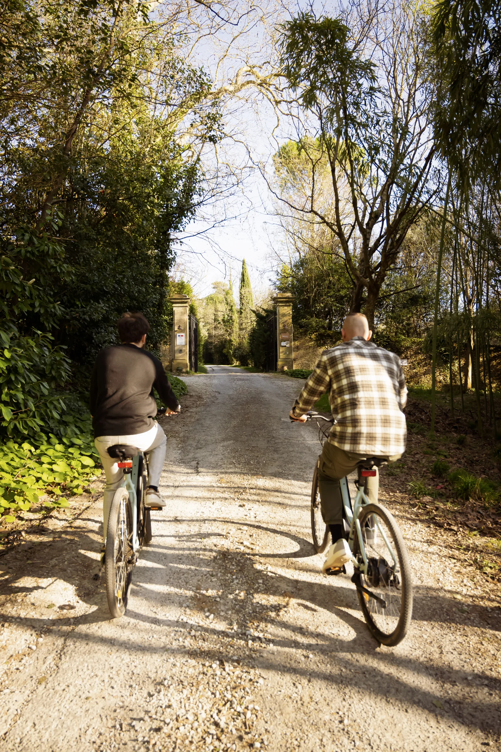 Cycling along the driveway of Domaine de Camboyer